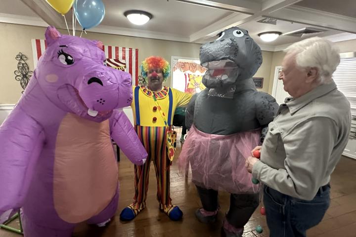 Happy Hippos (Chelsie O'Neal and Jessie Turner) with Gentiva Hospice entertain Danny and Stan during EMAL's 20th Anniversary carnival celebration!